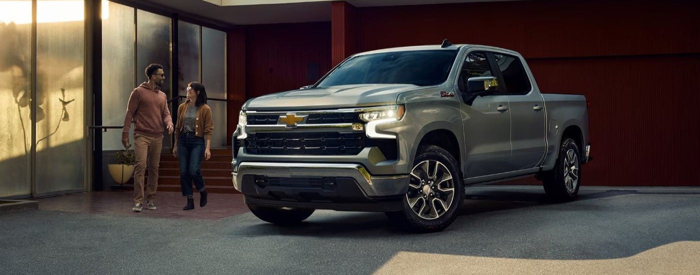 A grey 2024 Chevy Silverado 1500 Z71 parked in a driveway.