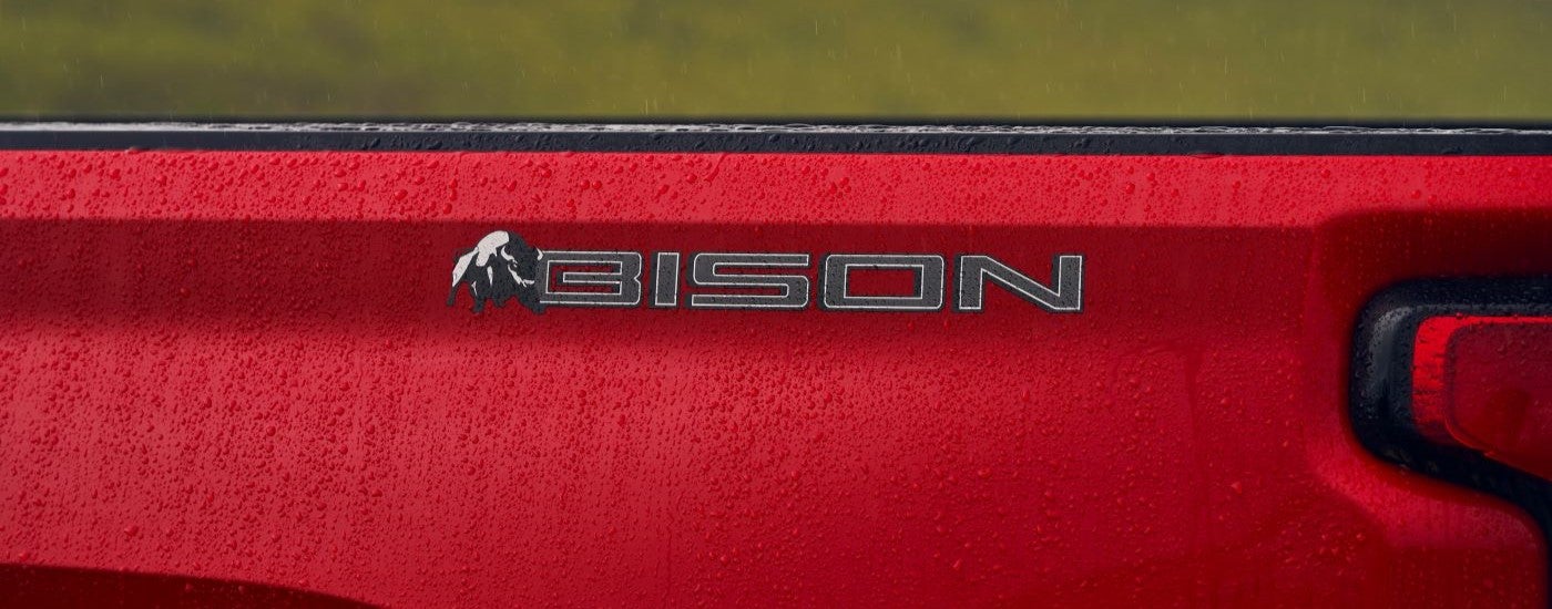 A close up shows the bison badge on a 2024 Chevy Silverado 2500HD ZR2 Bison.